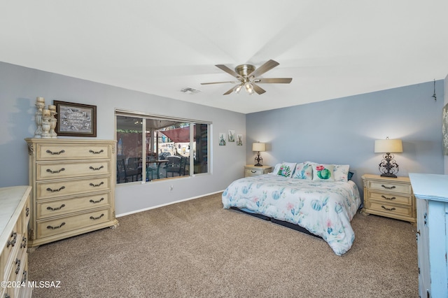 bedroom with ceiling fan and carpet