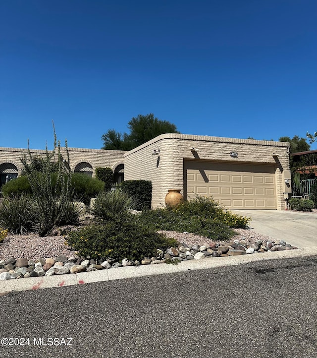 view of front of home with a garage