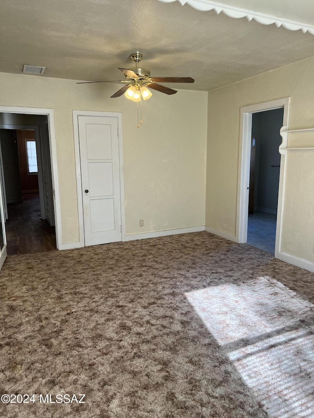 172 S Austin Blvd, Willcox, AZ 85643 - carpeted spare room featuring visible vents, a ceiling fan, and baseboards