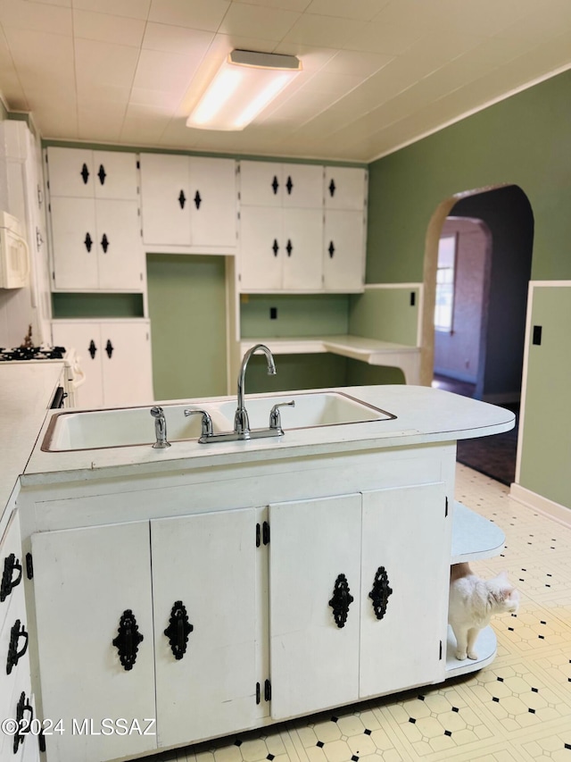 kitchen with white cabinets