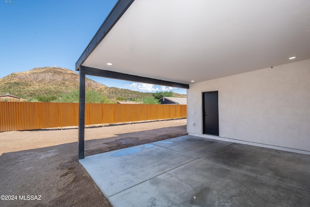view of patio featuring a mountain view