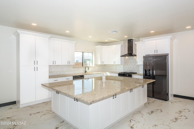 kitchen with wall chimney exhaust hood, backsplash, white cabinets, stainless steel refrigerator with ice dispenser, and a center island
