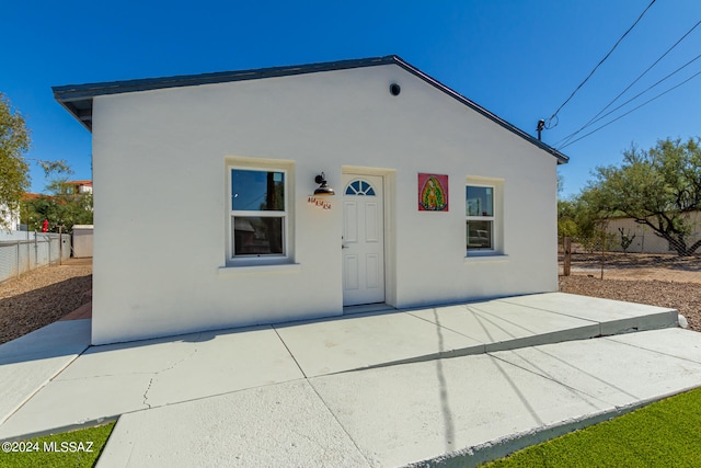 rear view of property with a patio area