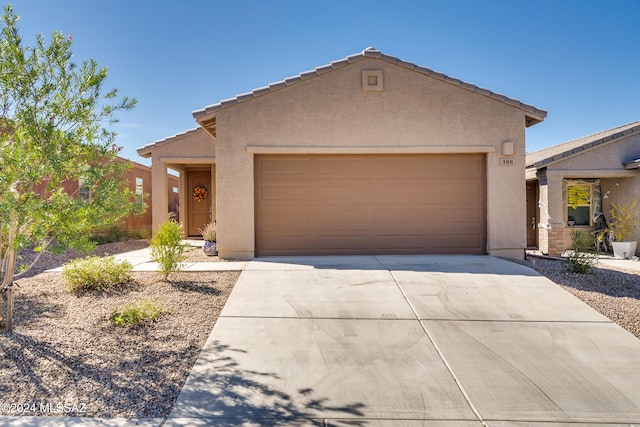 view of front of property featuring a garage