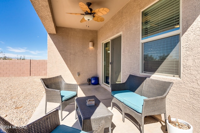 view of patio / terrace featuring an outdoor living space and ceiling fan