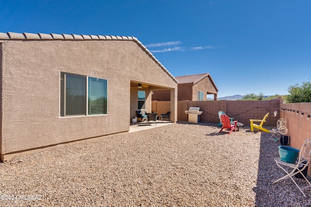 back of house with a patio area