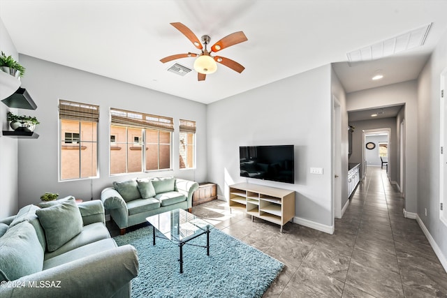 living room with ceiling fan