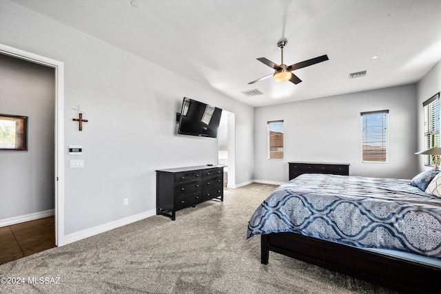 bedroom featuring ceiling fan and carpet flooring