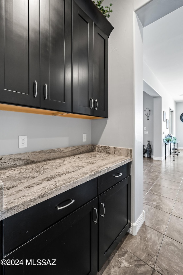 interior space with light stone countertops