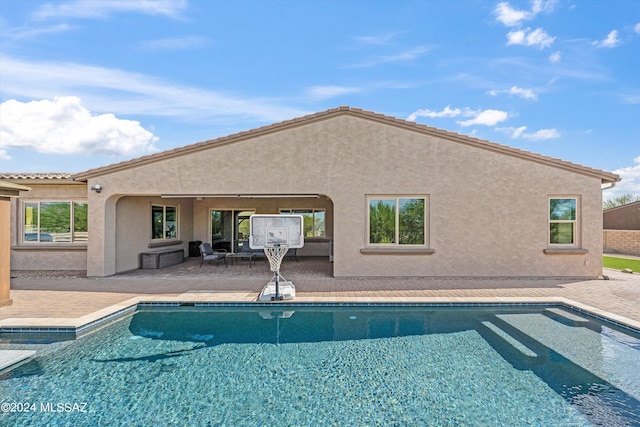 view of pool with a patio area