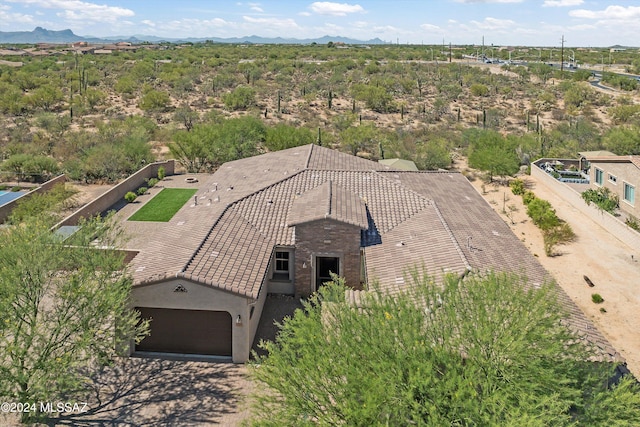 drone / aerial view featuring a mountain view