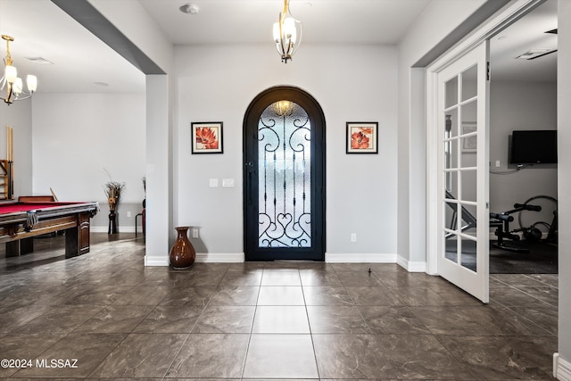 entrance foyer with french doors and pool table