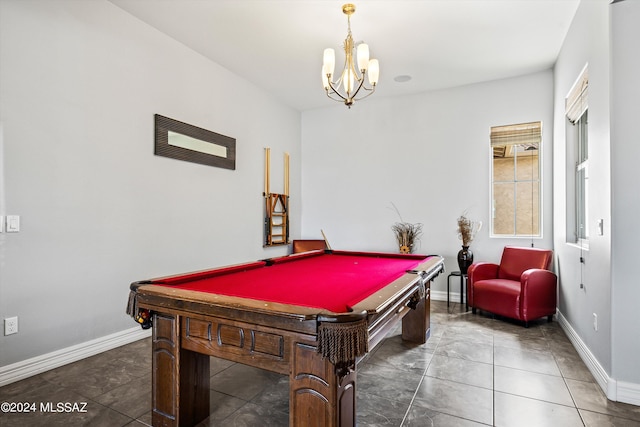 game room featuring an inviting chandelier, billiards, and dark tile patterned flooring