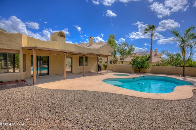 view of pool featuring a patio area