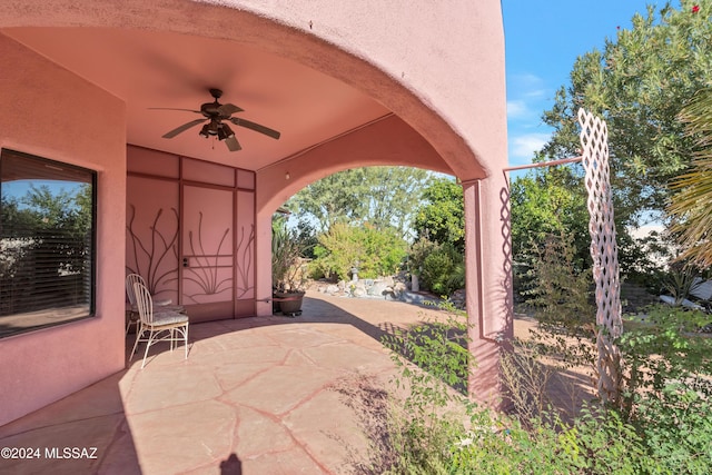 view of patio / terrace featuring ceiling fan