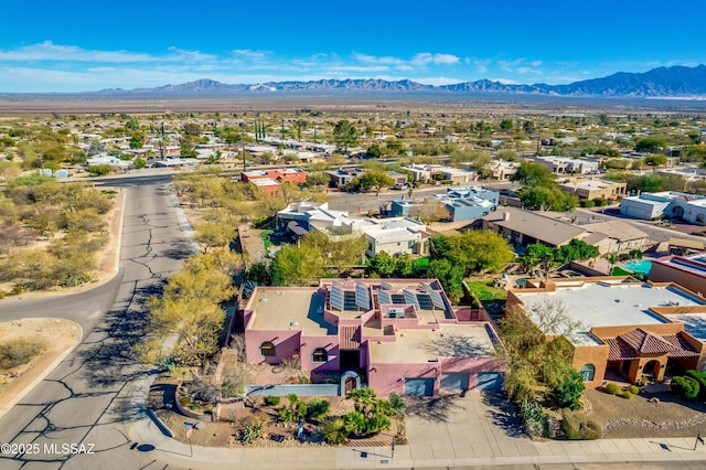 drone / aerial view featuring a mountain view