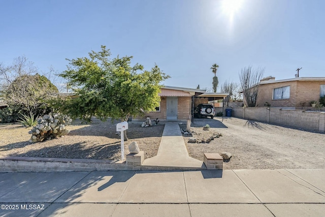 view of front of house featuring a carport