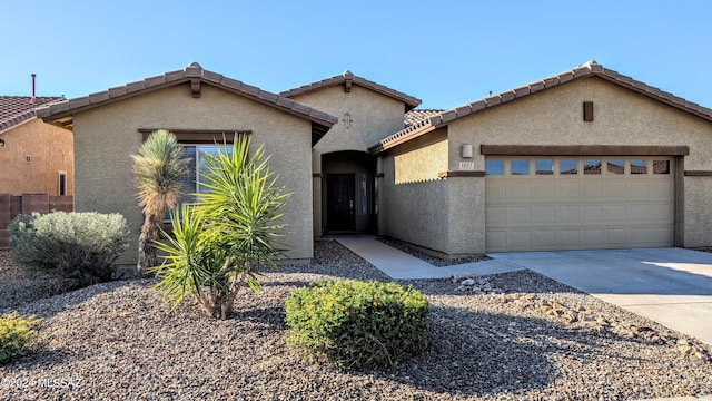 view of front of home with a garage