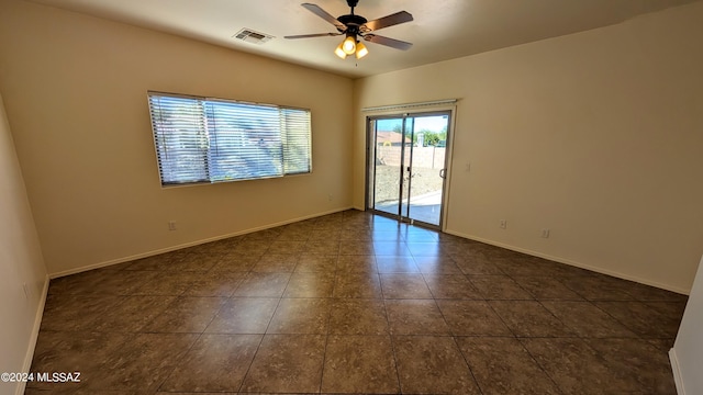 unfurnished room featuring ceiling fan