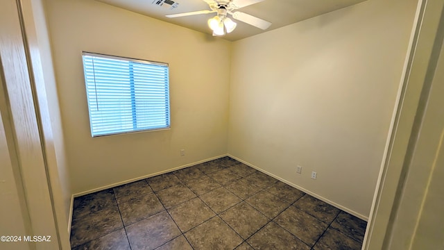 empty room featuring ceiling fan