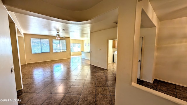 spare room featuring ceiling fan