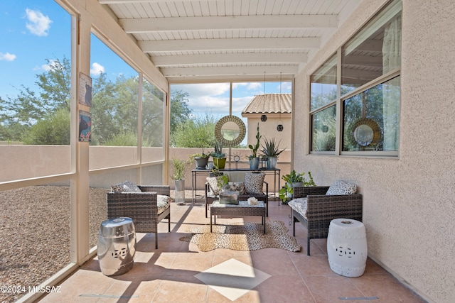 sunroom / solarium with beamed ceiling and wood ceiling