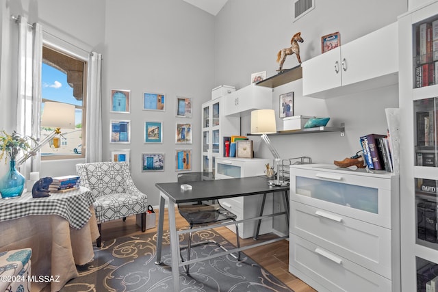 office area featuring dark wood-type flooring