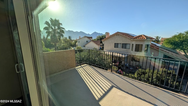 balcony featuring a mountain view