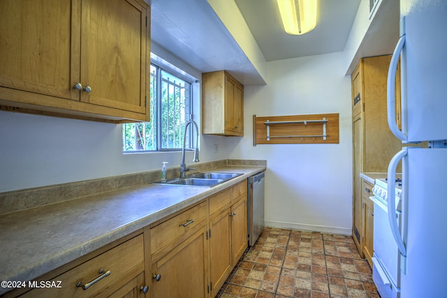 kitchen with sink and white appliances