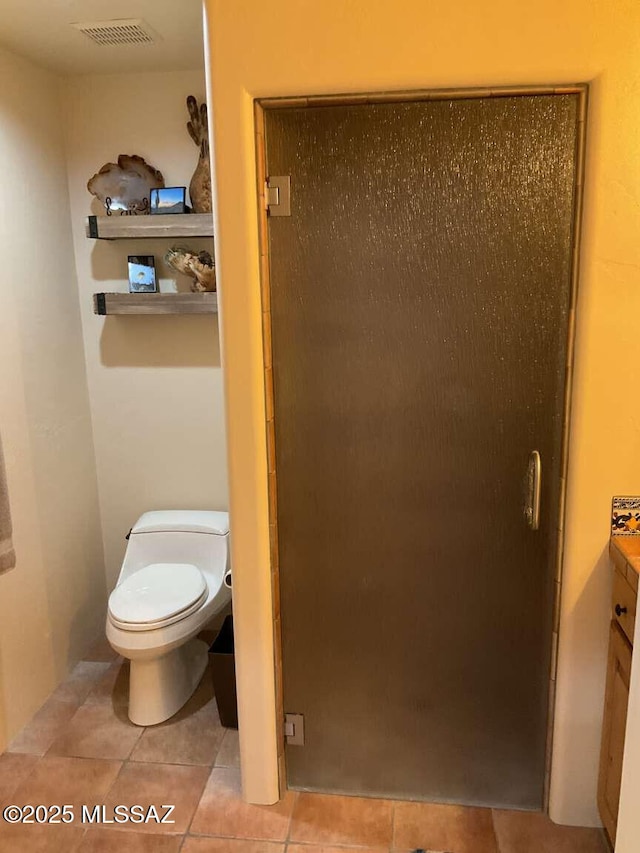 5550 W Open R Pl, Tucson, AZ 85713 - bathroom featuring tile patterned floors and toilet