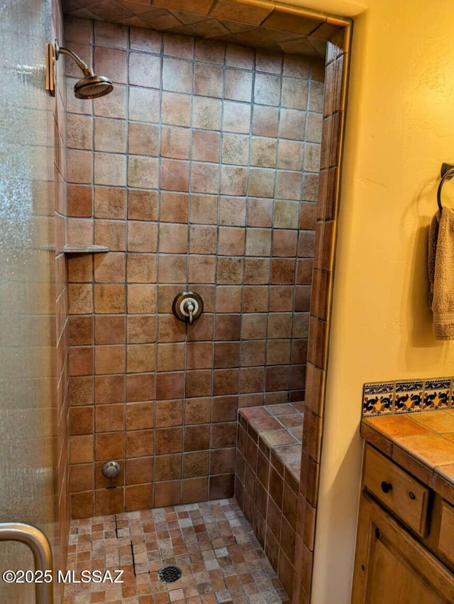 5550 W Open R Pl, Tucson, AZ 85713 - full bathroom with a tile shower and vanity