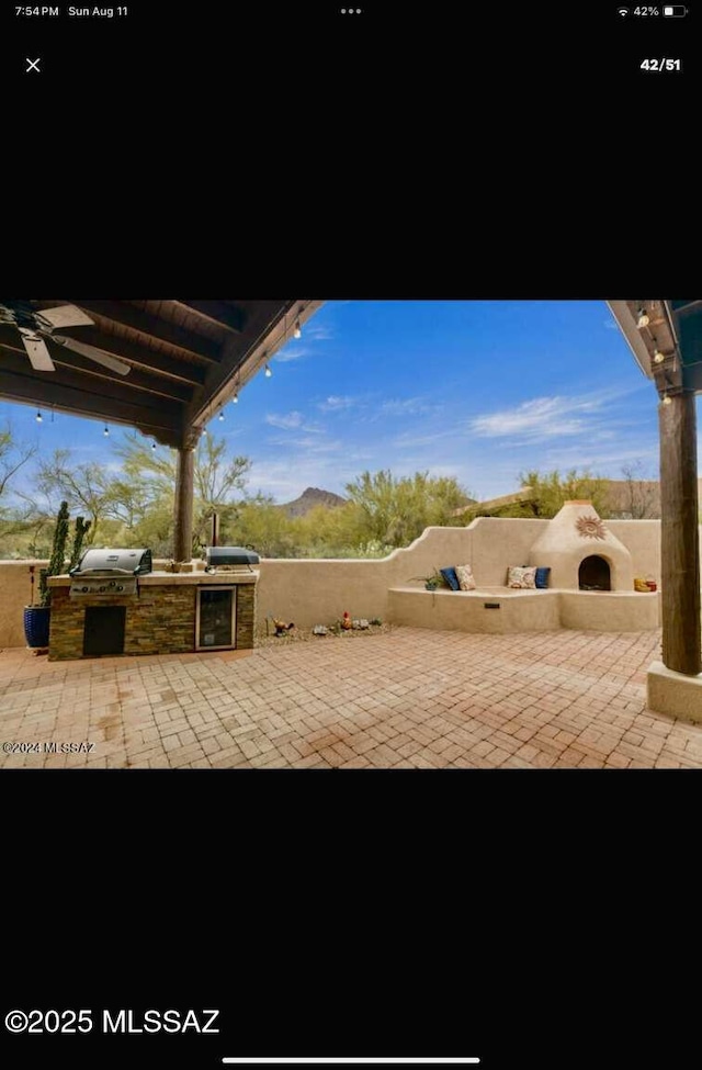 5550 W Open R Pl, Tucson, AZ 85713 - view of patio featuring area for grilling and a mountain view