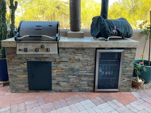 5550 W Open R Pl, Tucson, AZ 85713 - view of patio with a grill, beverage cooler, and area for grilling