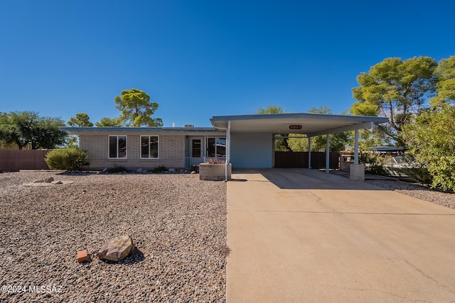 view of front of house with a carport