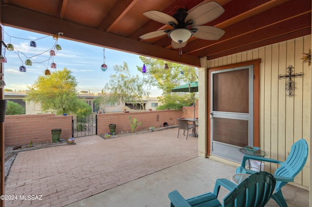 2798 S Camino Selva, Green Valley, AZ 85622 - view of patio featuring fence, a ceiling fan, and a gate