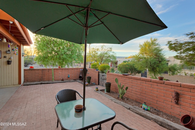 view of patio / terrace featuring outdoor dining space and a fenced backyard