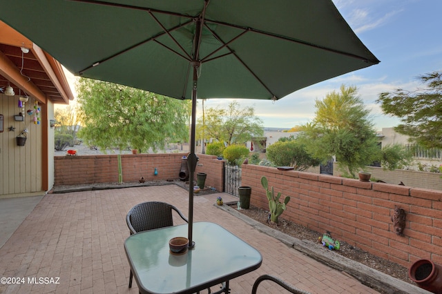 2798 S Camino Selva, Green Valley, AZ 85622 - view of patio with outdoor dining area and a fenced backyard