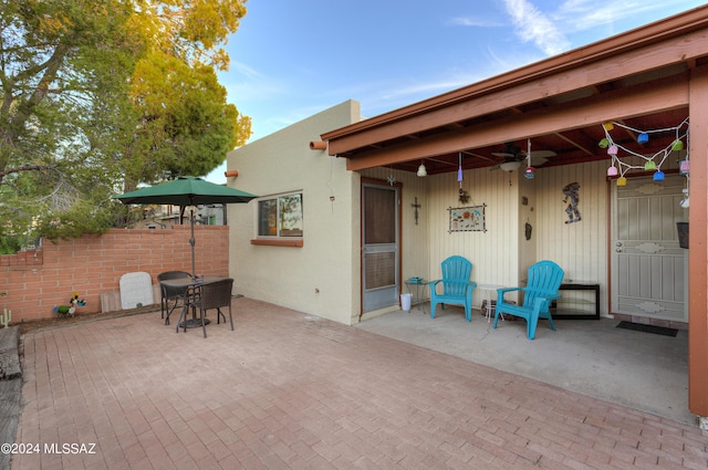 2798 S Camino Selva, Green Valley, AZ 85622 - view of patio featuring fence, a ceiling fan, and outdoor dining space