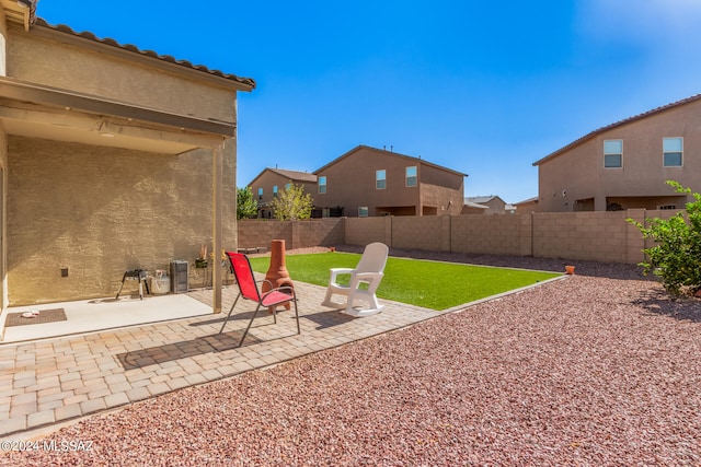 view of yard with a patio area