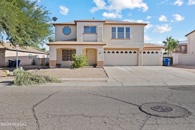 view of property featuring a garage