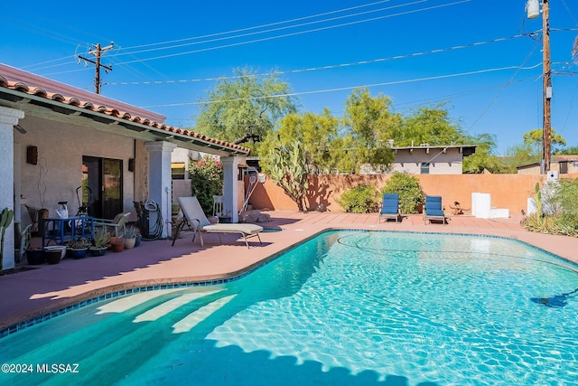 view of pool with a patio