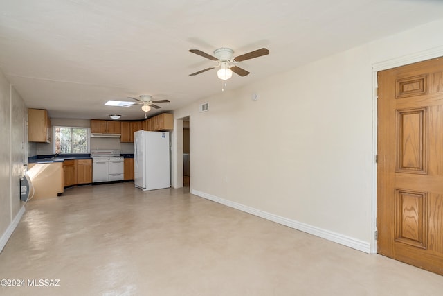 kitchen with ceiling fan and white appliances