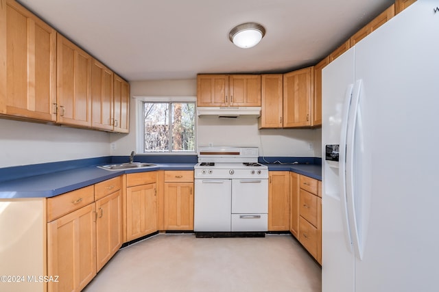 kitchen featuring sink and white appliances