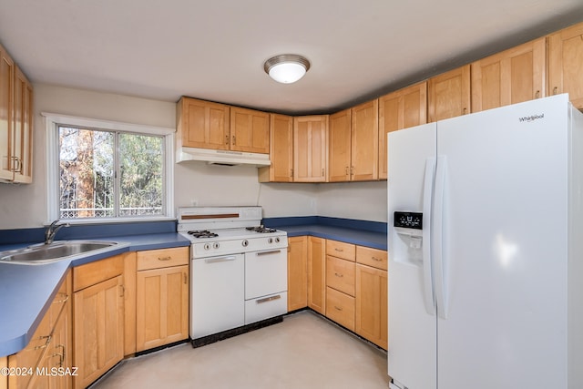 kitchen featuring white appliances and sink