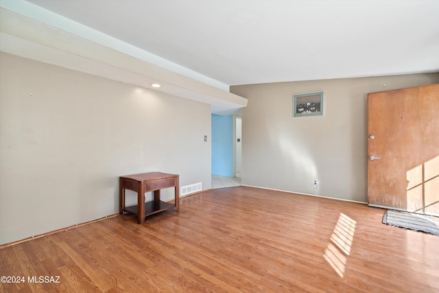 unfurnished room featuring light wood-type flooring