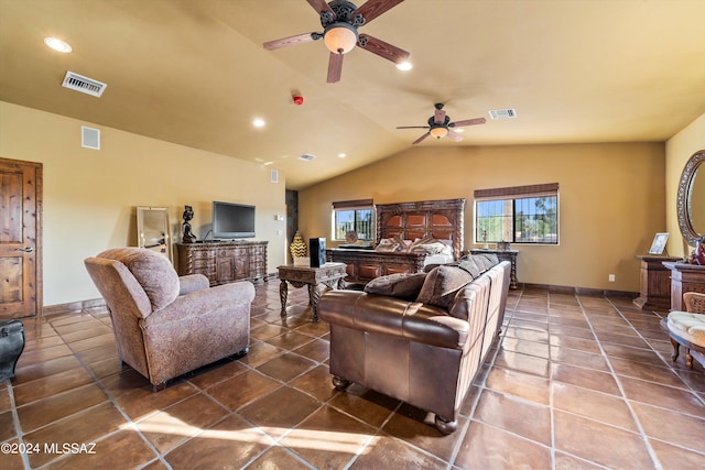 living room with lofted ceiling, tile patterned flooring, and ceiling fan