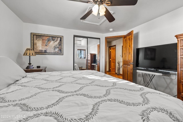 bedroom featuring a closet and ceiling fan