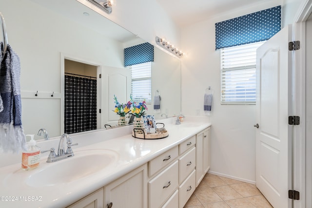 bathroom with vanity and tile patterned flooring