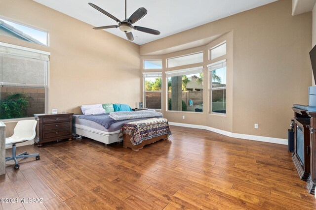 bedroom featuring wood-type flooring and ceiling fan