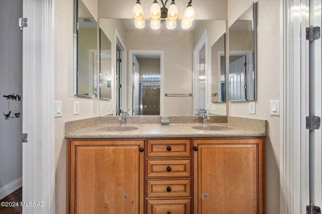 bathroom featuring vanity and hardwood / wood-style flooring